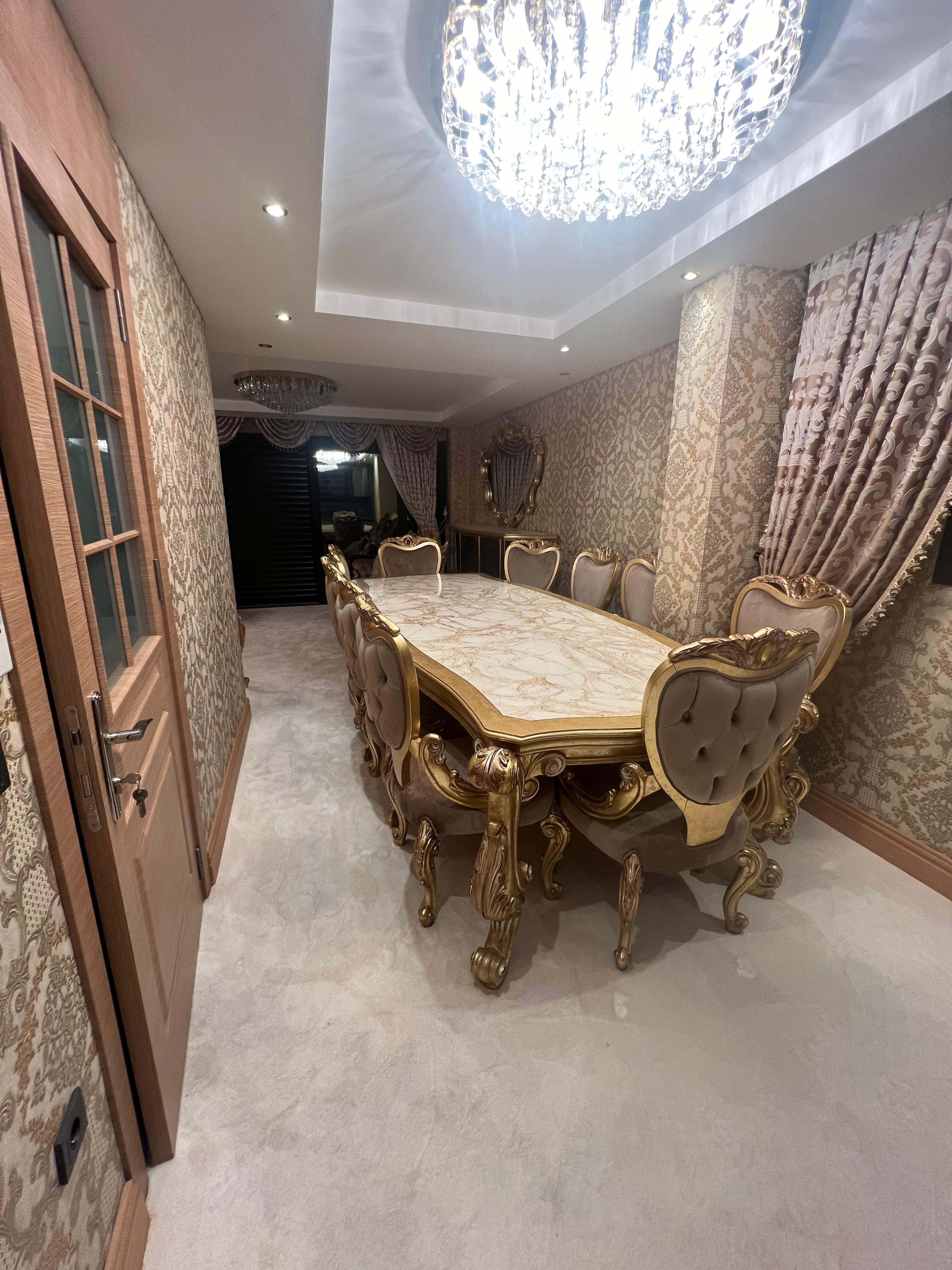 Villa E master bedroom with taupe upholstery and sea view